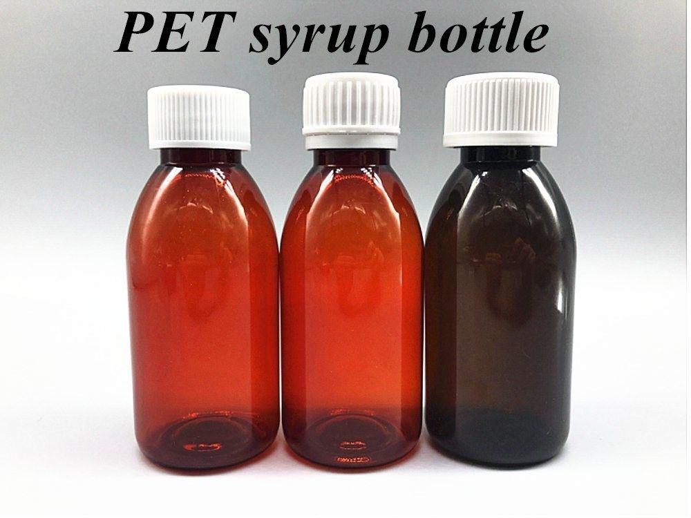 Bouteille de sirop en plastique ambrée liquide de 100 ml à 120 ml avec couvercle à vis Bouteille en plastique de sirop en plastique en PET rond vide