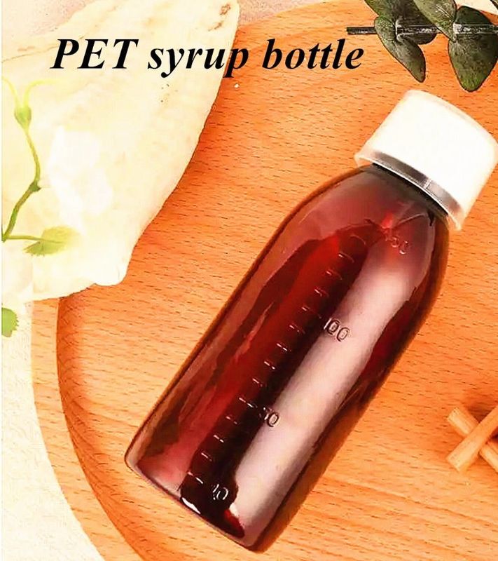 100 ml 250 ml de médicament liquide Ambre PET Bouteille de sirop pour la toux avec tasse à mesurer Bouteille de plastique de sirop pour la toux