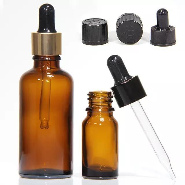 Bouteille d' huile essentielle en verre cosmétique mini ronde vide de 10 ml, 20 ml, 30 ml et 50 ml avec gouttière en plastique noir