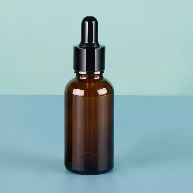 Serum de maquillage de luxe personnalisé pour les soins de la peau Utilisez de l' ambre brun vide goutteilleuse d' huile essentielle avec pipette