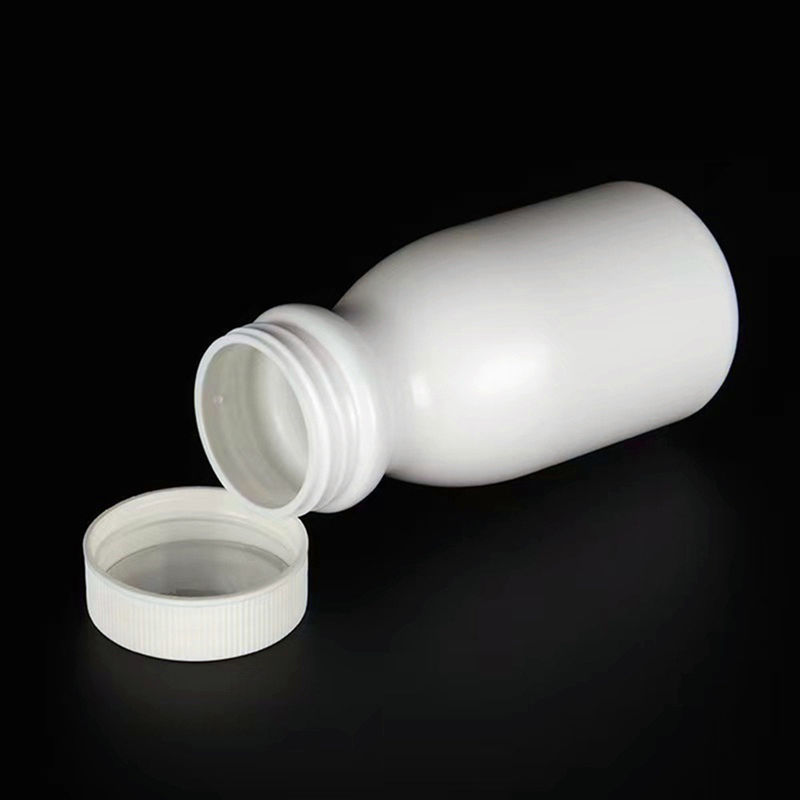 Vacuum Ronde 50 ml 100 ml 150 ml Capsule en HDPE blanc Comprimés pilule Bouteilles de plastique Suppléments de plastique Bouteille de médicament PE en plastique