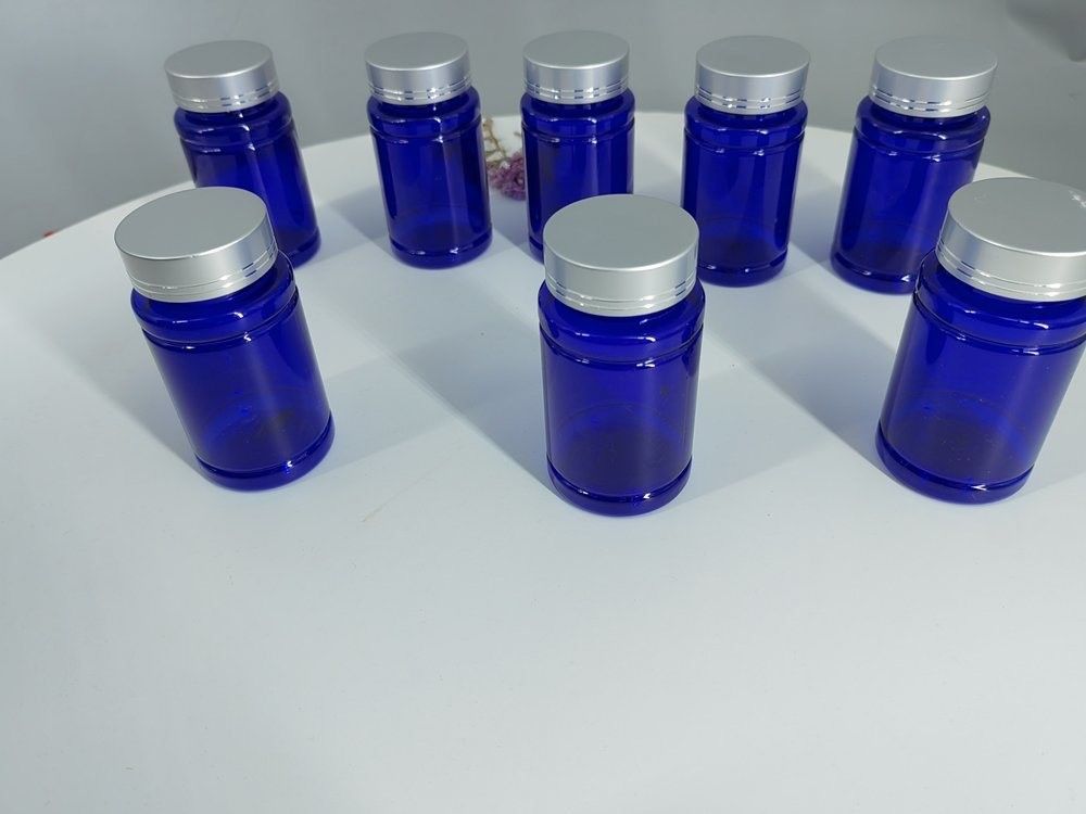 Bouteille en plastique de 100cc 120cc pour pilules Capsules bleu transparent PET rechargeable en plastique solide poudre de pilule Bouteille de médicament